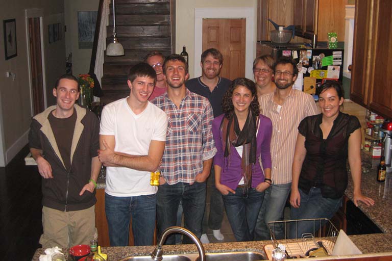Rich and lab members pose for a group photo during a lab party.